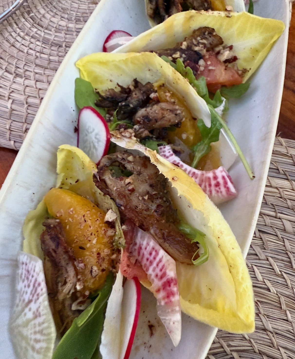 Endive boats with grilled meat and citrus as a starter at Lua Beach House, Turks and Caicos